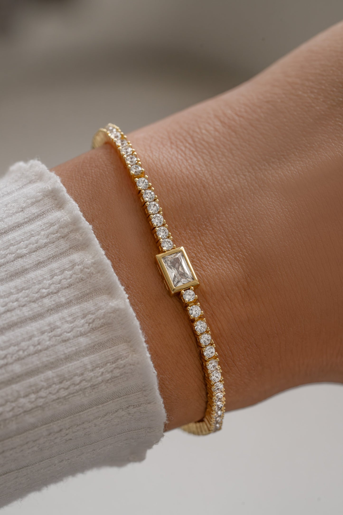 Bezeled Emerald-Cut Charm Tennis Bracelet